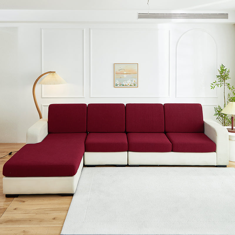 Housse de coussin de canapé déperlante, Bordeaux foncé, posée sur les coussins d'assise et de dossier d'un canapé