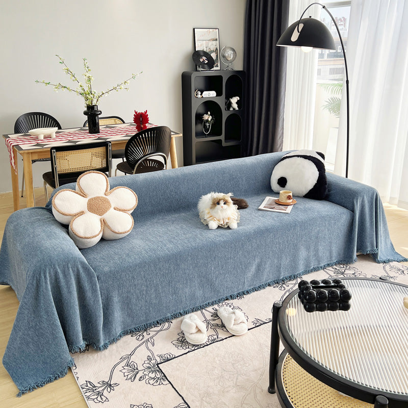 Jeté de canapé tissé Bleu denim, posé et drapé sur un canapé