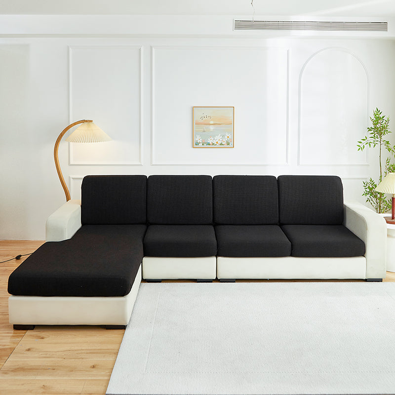 Housse de coussin de canapé déperlante, Noir, posée sur les coussins d'assise et de dossier d'un canapé