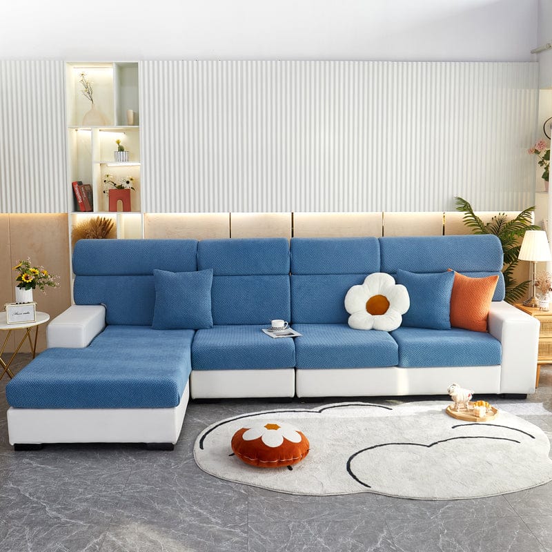 Housse de coussin de canapé polaire, Bleu ciel natté, posée sur les coussins d'assise et de dossier d'un canapé