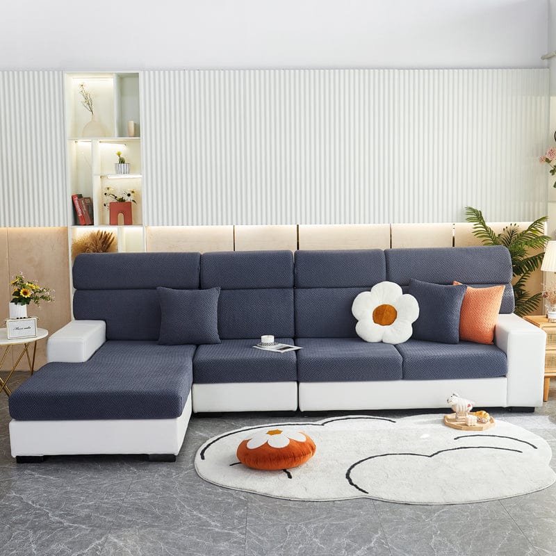 Housse de coussin de canapé polaire, Bleu marine natté, posée sur les coussins d'assise et de dossier d'un canapé