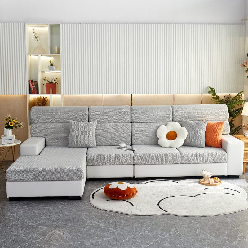 Housse de coussin de canapé polaire, Gris clair natté, posée sur les coussins d'assise et de dossier d'un canapé