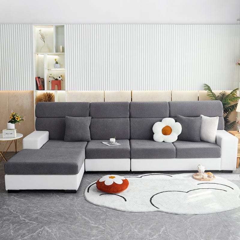 Housse de coussin de canapé polaire, Gris natté, posée sur les coussins d'assise et de dossier d'un canapé