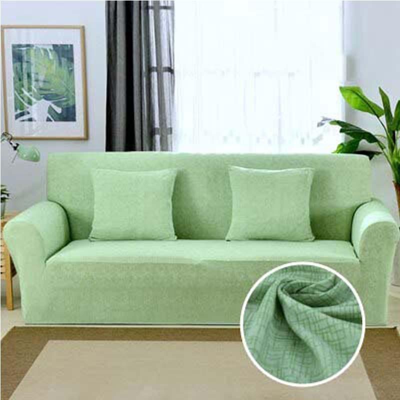 Housse de canapé extensible Vert amande chiné