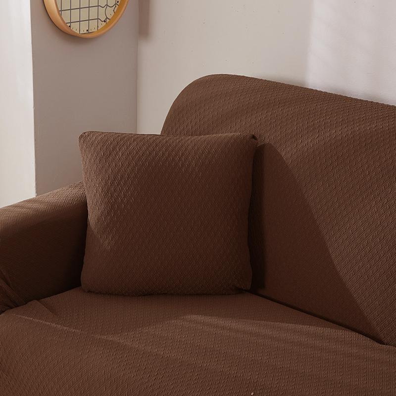 Housse de coussin déperlante 45×45, à l'unité, Café, posée sur un canapé