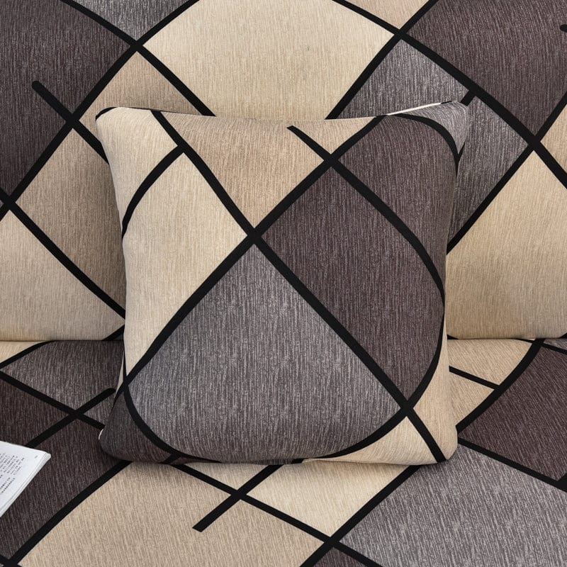 Housses de coussin extensibles 45×45, lot de 2, Brun losanges, posée sur un canapé
