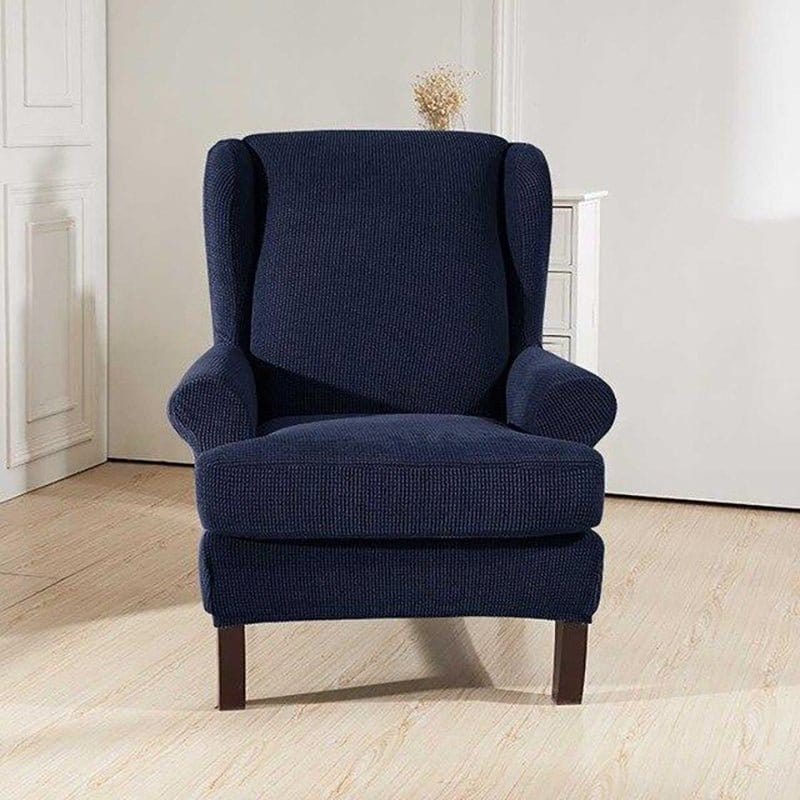 Housse de fauteuil à oreilles déperlante, Bleu marine, posée sur un fauteuil à oreilles