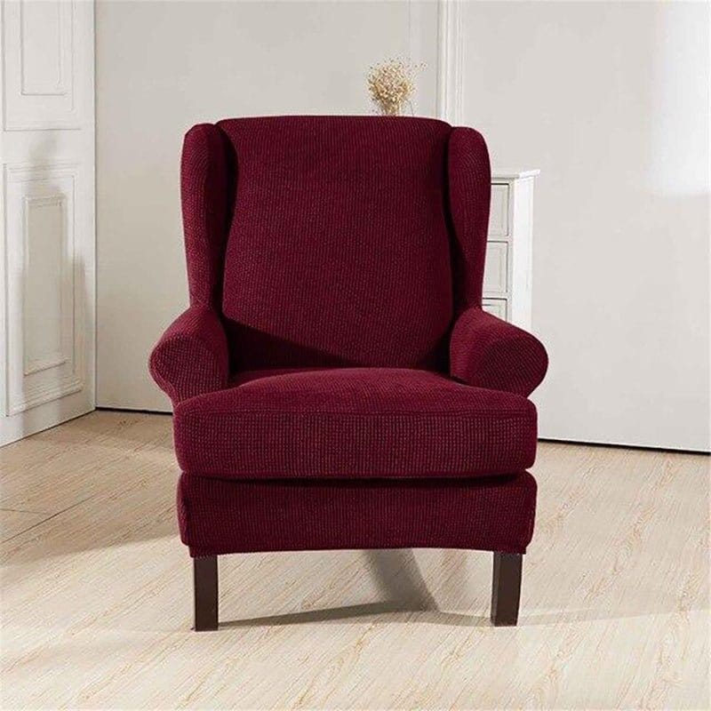 Housse de fauteuil à oreilles déperlante, Bordeaux profond, posée sur un fauteuil à oreilles