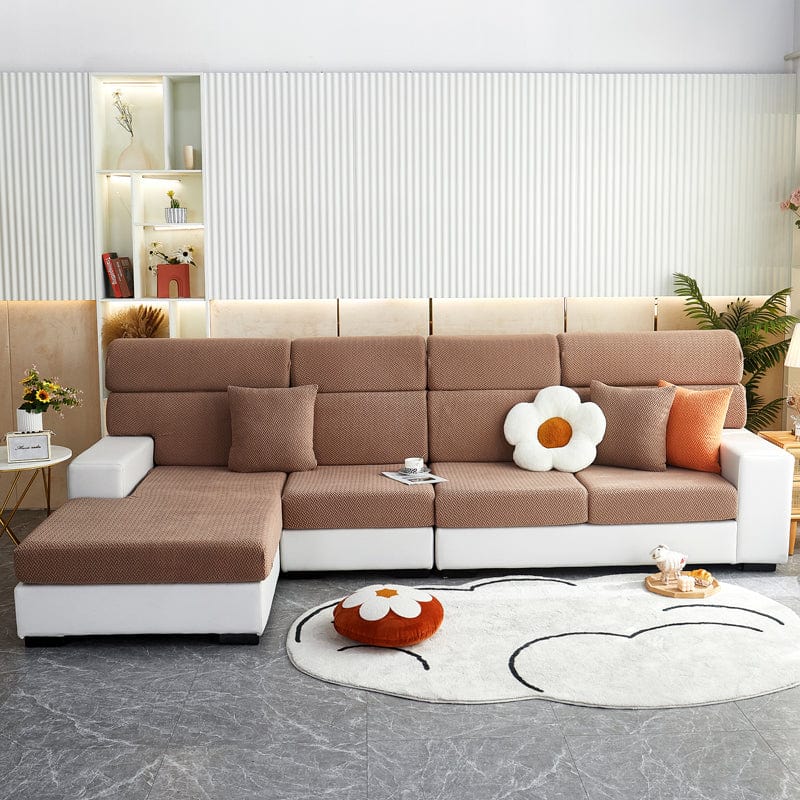 Housse de coussin de canapé polaire, Marron natté, posée sur les coussins d'assise et de dossier d'un canapé