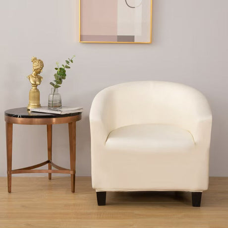 Housse de fauteuil cabriolet en simili cuir, Ivoire, posée sur un fauteuil cabriolet