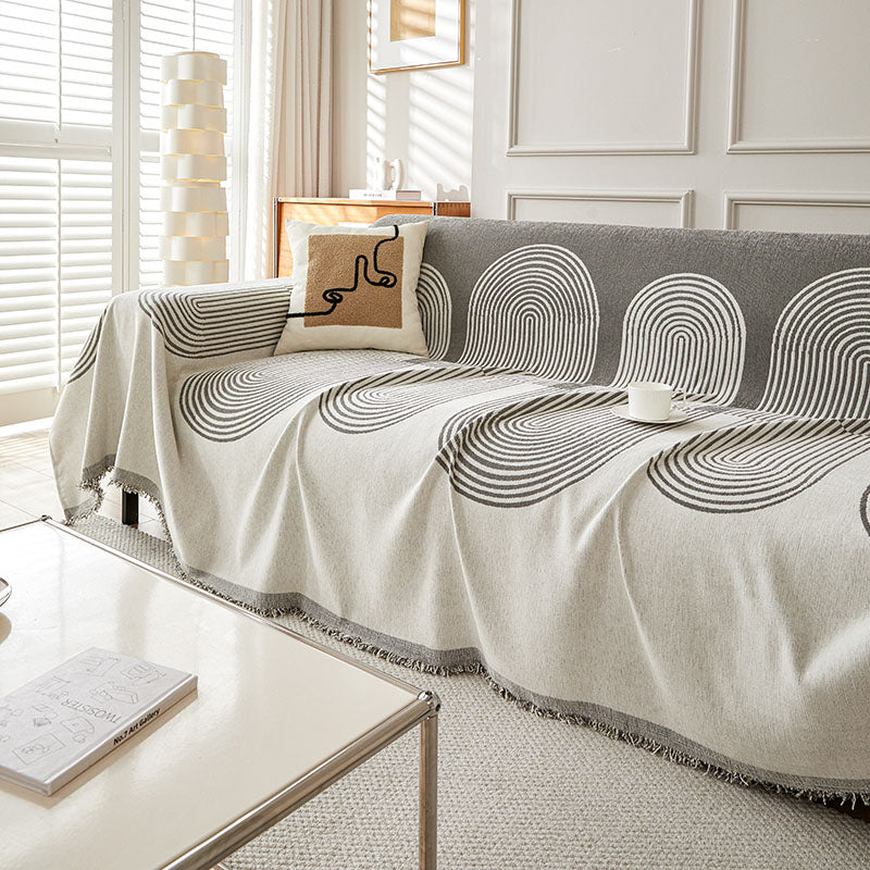 Jeté de canapé tissé Gris arches, posé et drapé sur un canapé — vue 4