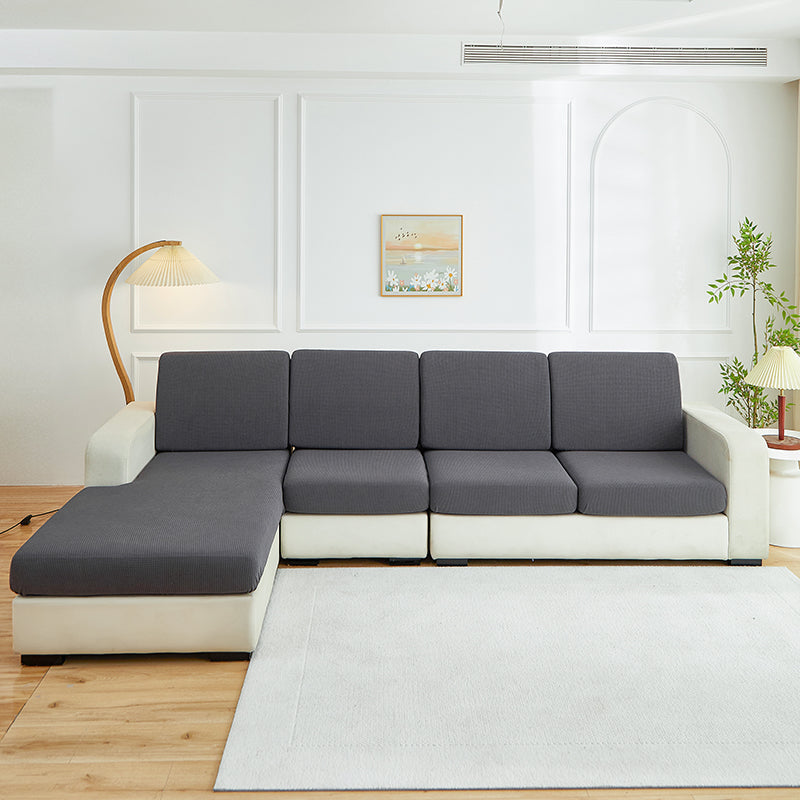 Housse de coussin de canapé déperlante, Gris, posée sur les coussins d'assise et de dossier d'un canapé