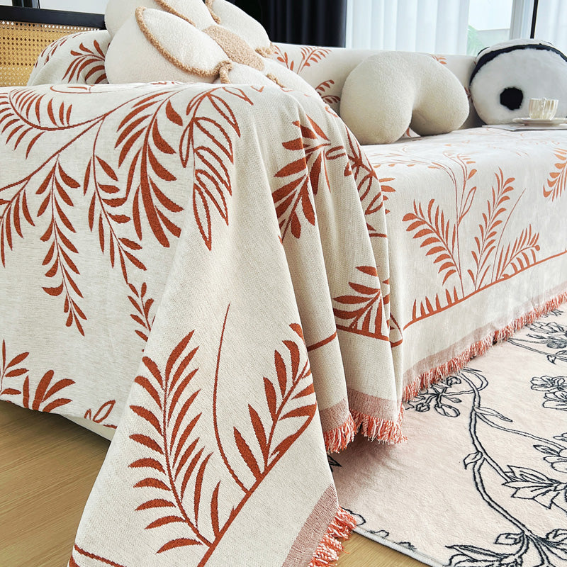 Jeté de canapé tissé Terracotta rameaux, posé et drapé sur un canapé — vue 4