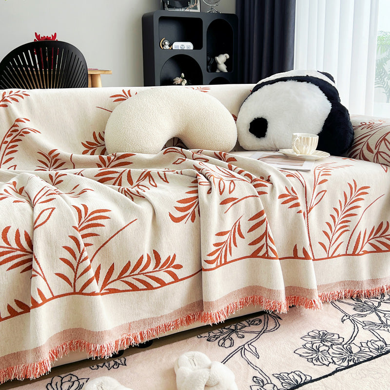 Jeté de canapé tissé Terracotta rameaux, posé et drapé sur un canapé — vue 5