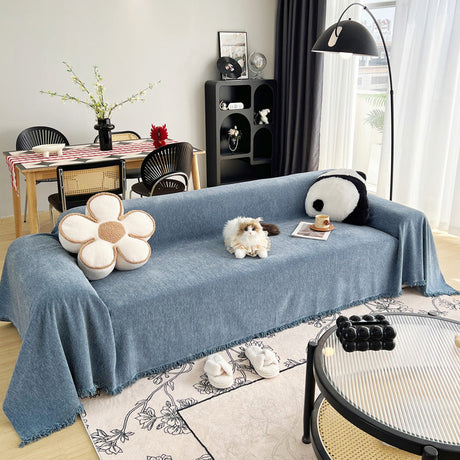 Jeté de canapé tissé Bleu denim, posé et drapé sur un canapé