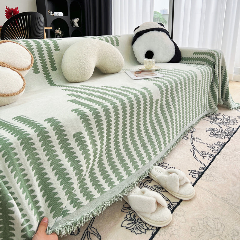 Jeté de canapé tissé Vert fougères, posé et drapé sur un canapé — vue 5