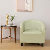 Housse de fauteuil cabriolet en simili cuir, Vert amande, posée sur un fauteuil cabriolet