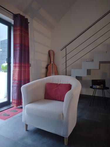 Fauteuil cabriolet habillé d'une housse déperlante Écru, photo envoyée par Fabienne G. avec son avis
