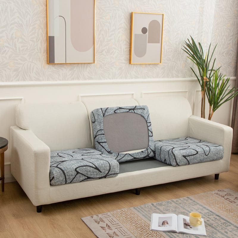 Housse de coussin de canapé extensible, Gris fleurs géantes, posée sur les coussins d'assise et de dossier d'un canapé — vue 2