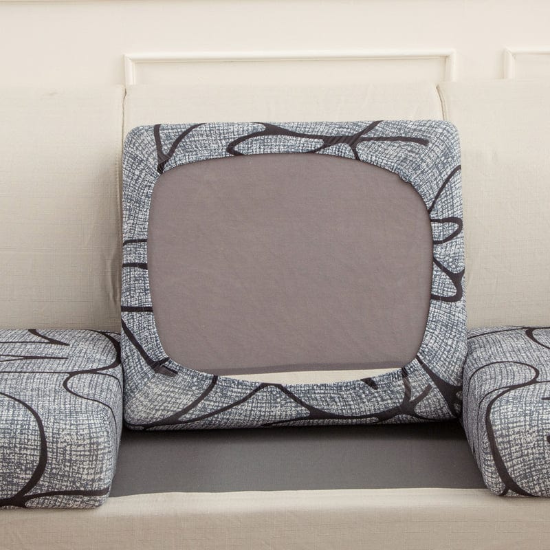 Housse de coussin de canapé extensible, Gris fleurs géantes, posée sur les coussins d'assise et de dossier d'un canapé — vue 3