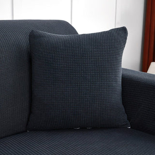 Housse de coussin déperlante 45×45, à l'unité, Gris, posée sur un canapé