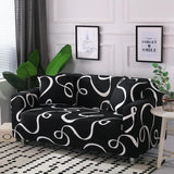 Housse de canapé extensible Noir volutes