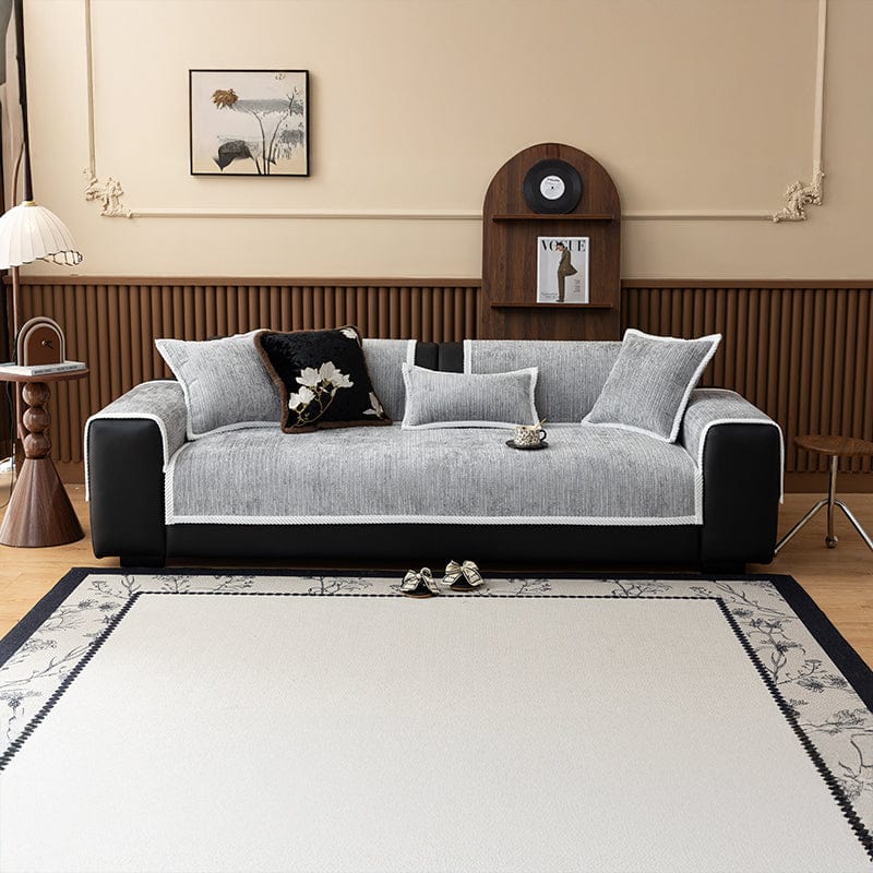 Housse de canapé EasyCover chenille côtelé, Gris clair côtelé, posée sur un canapé