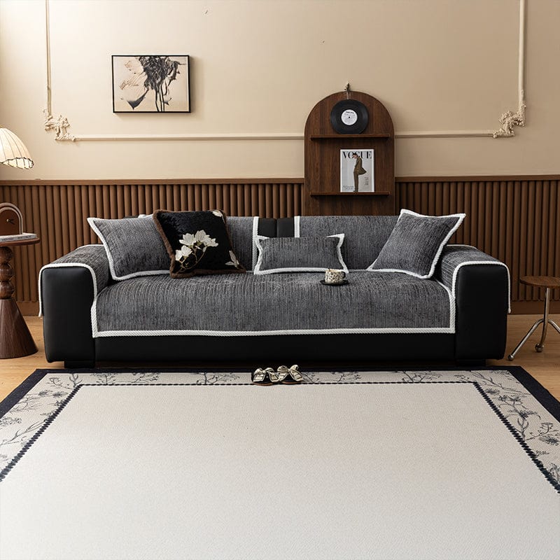 Housse de canapé EasyCover chenille côtelé, Gris foncé côtelé, posée sur un canapé