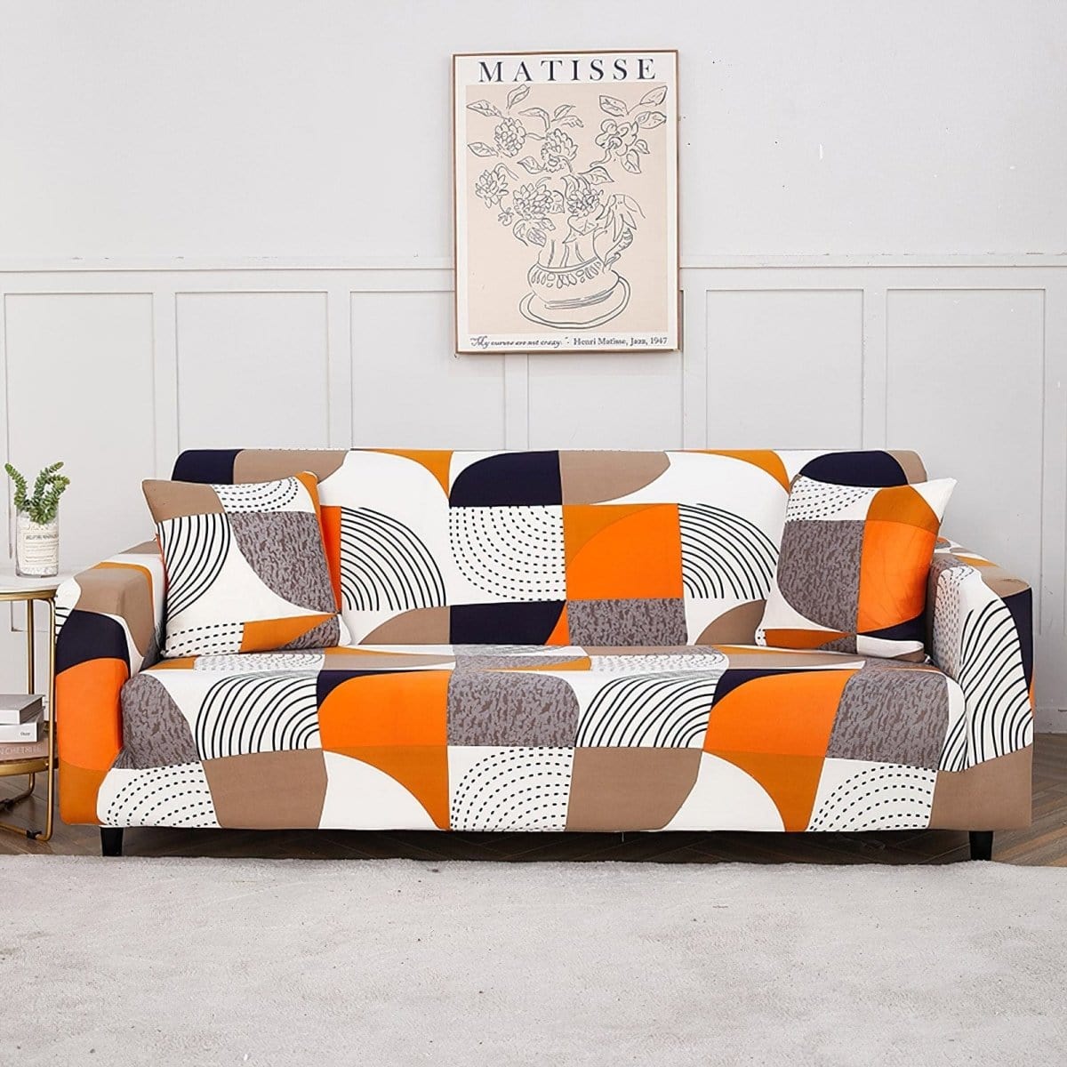 Housse de canapé extensible Patchwork orange et noir
