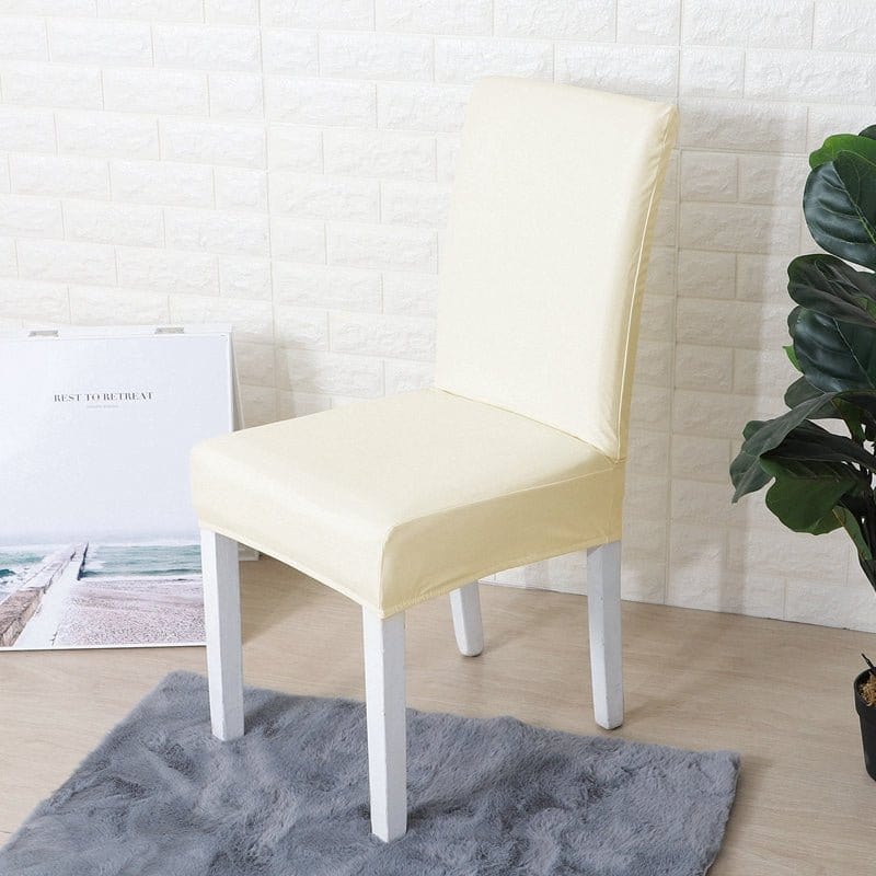 Housse de chaise en simili cuir, Ivoire, posée sur une chaise