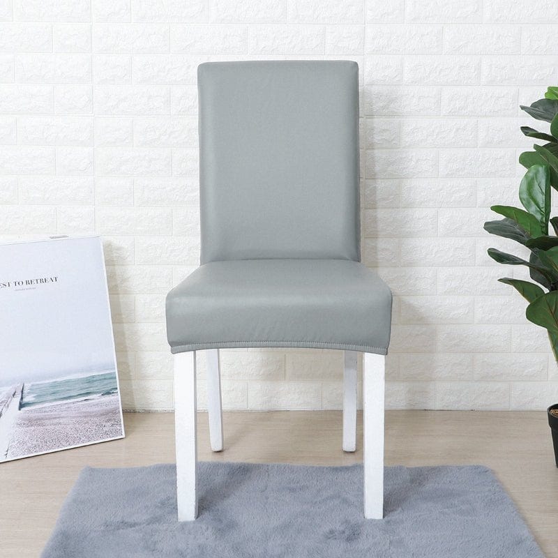 Housse de chaise en simili cuir, Gris galet, posée sur une chaise — vue 2