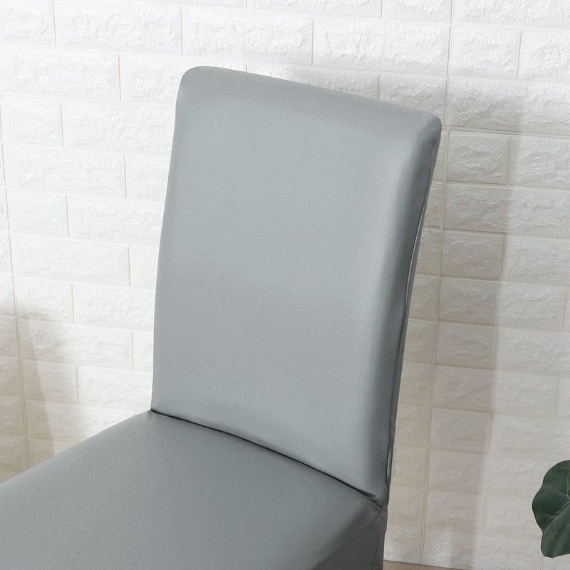 Housse de chaise en simili cuir, Gris galet, posée sur une chaise — vue 5