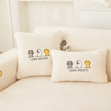 Housse de coussin EasyCover sherpa bouclé 45×45, à l'unité, Blanc crème moutonné, posée sur un canapé