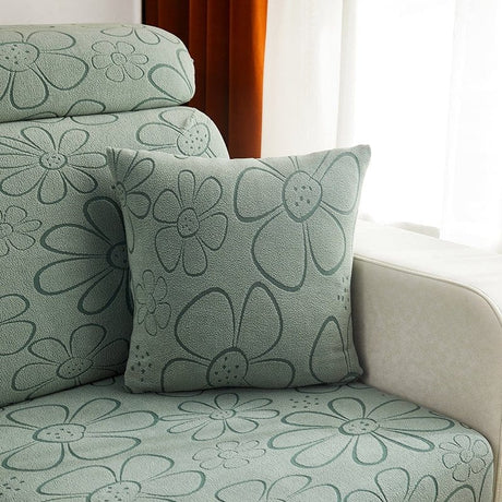 Housses de coussin polaires 45×45, lot de 2, Vert fleurs en relief, posée sur un canapé