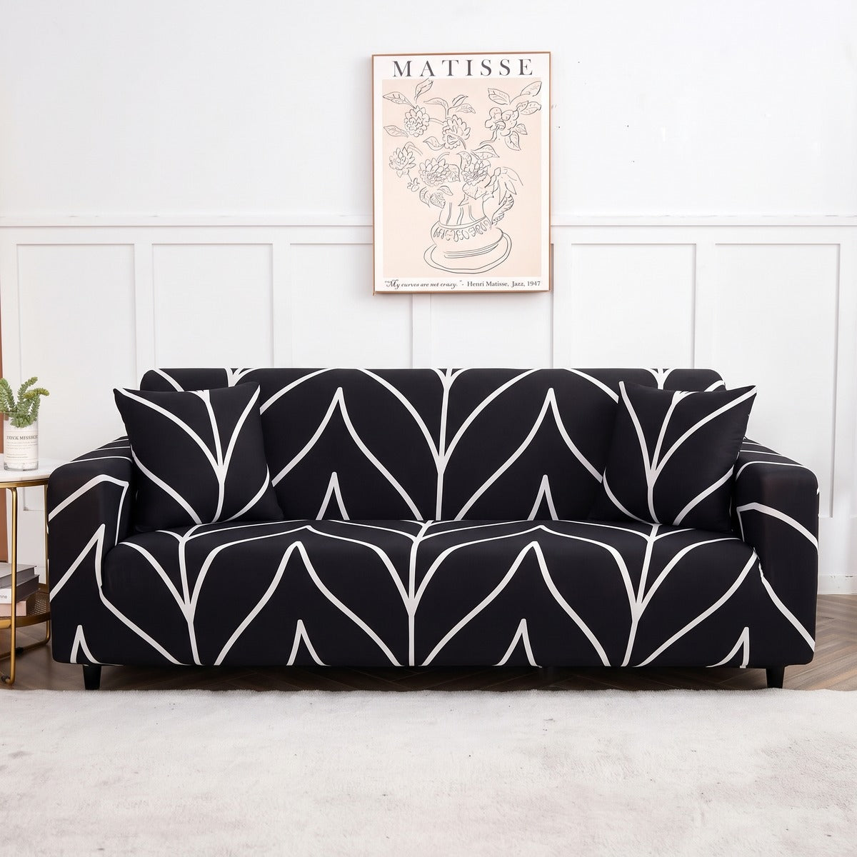 Housse de canapé extensible Noir feuillage