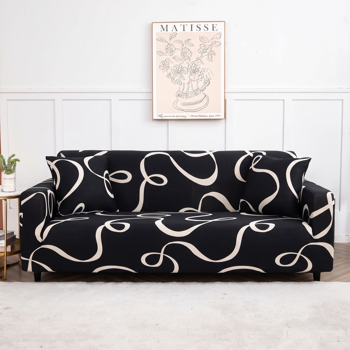 Housse de canapé extensible Noir volutes
