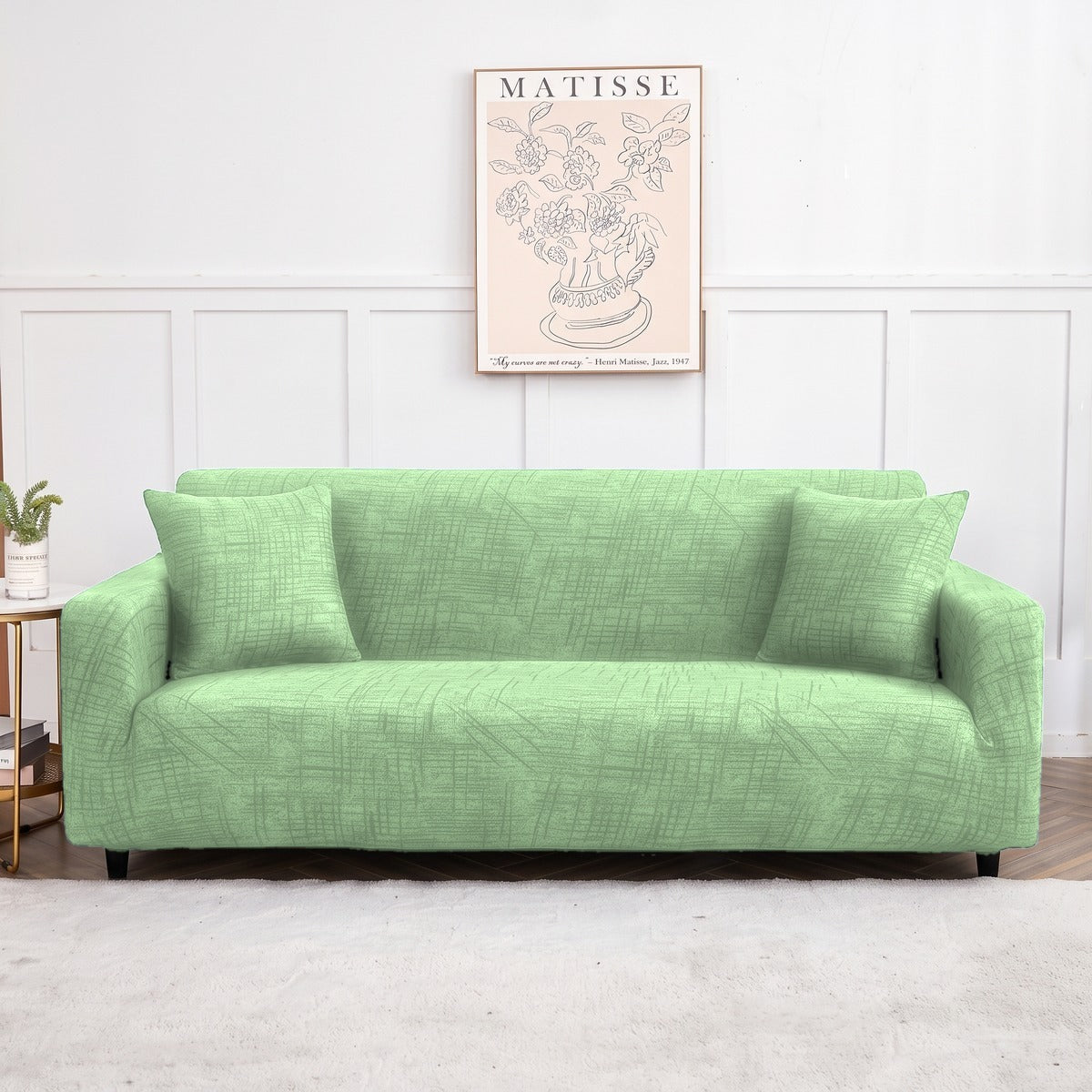 Housse de canapé extensible Vert amande chiné
