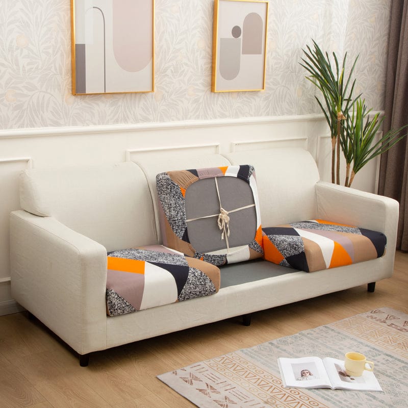 Housse de coussin de canapé extensible, Patchwork orange et marine, posée sur les coussins d'assise et de dossier d'un canapé — vue 2