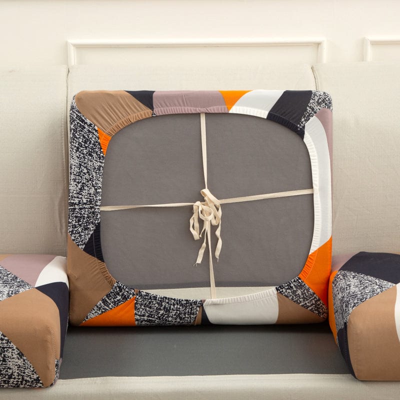 Housse de coussin de canapé extensible, Patchwork orange et marine, posée sur les coussins d'assise et de dossier d'un canapé — vue 3