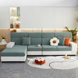 Housse de coussin de canapé polaire, Vert natté, posée sur les coussins d'assise et de dossier d'un canapé
