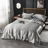 Parure de lit Gris type satin - Drap housse / Housse de couette / 2 taies d'oreiller La Maison des Housses