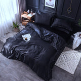 Parure de lit Noir type satin - Drap housse / Housse de couette / 2 taies d'oreiller La Maison des Housses