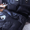 Parure de lit Noir type satin - Drap housse / Housse de couette / 2 taies d'oreiller La Maison des Housses